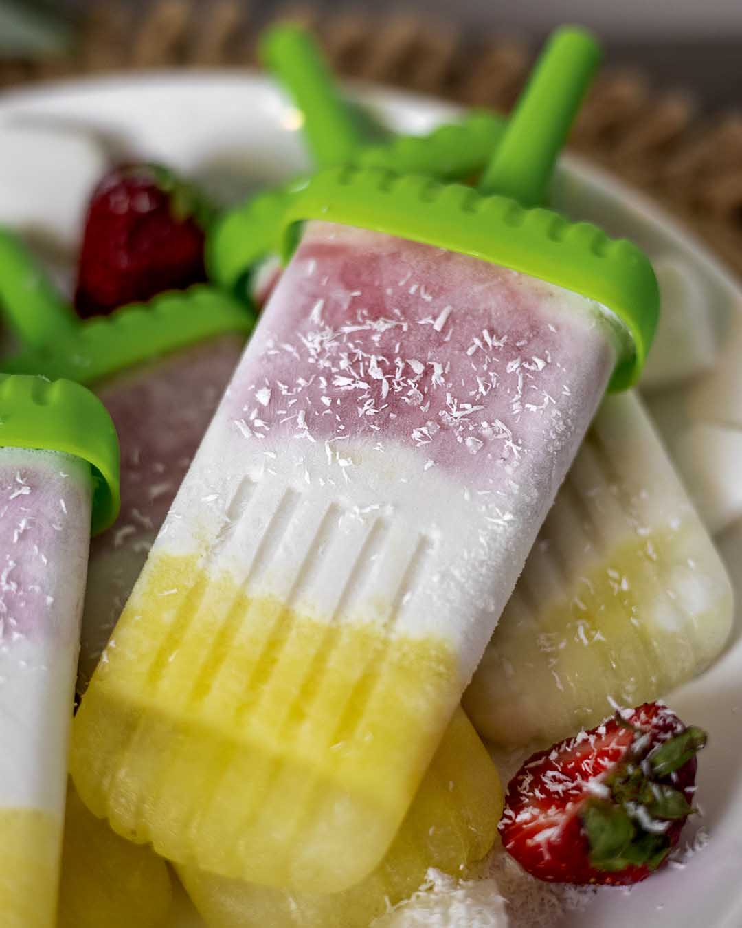 pina colada popsicle with fresh coconut