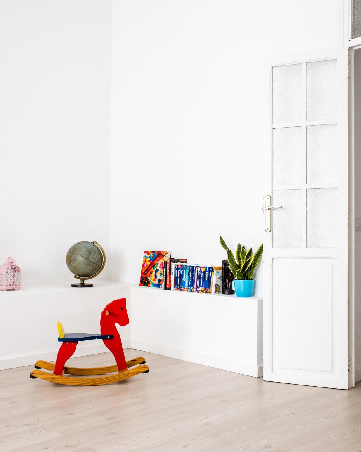 kids room with books and globe