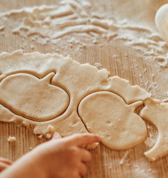 pumpkin shapes cut into dough