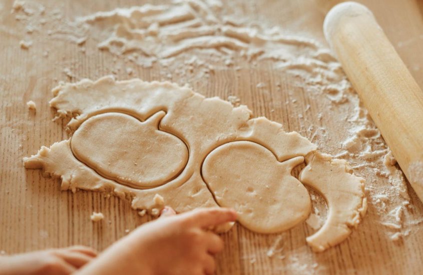 pumpkin shapes cut into dough