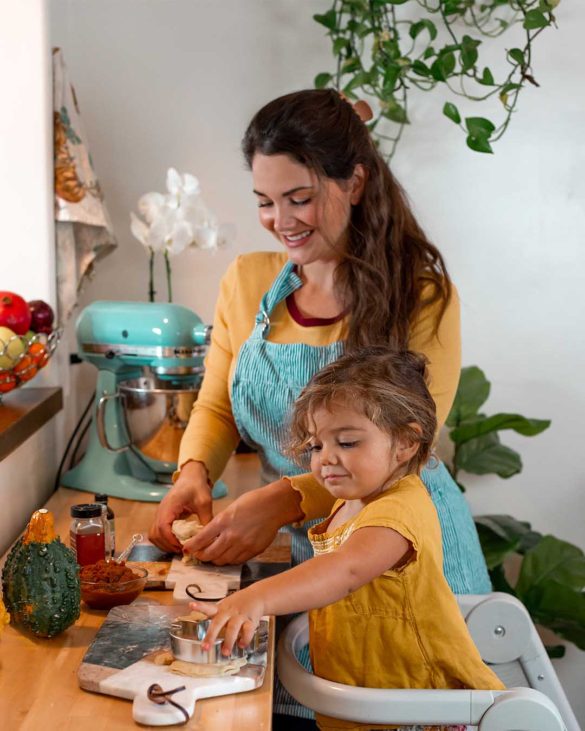 Mom and daughter cooking in the kitchen