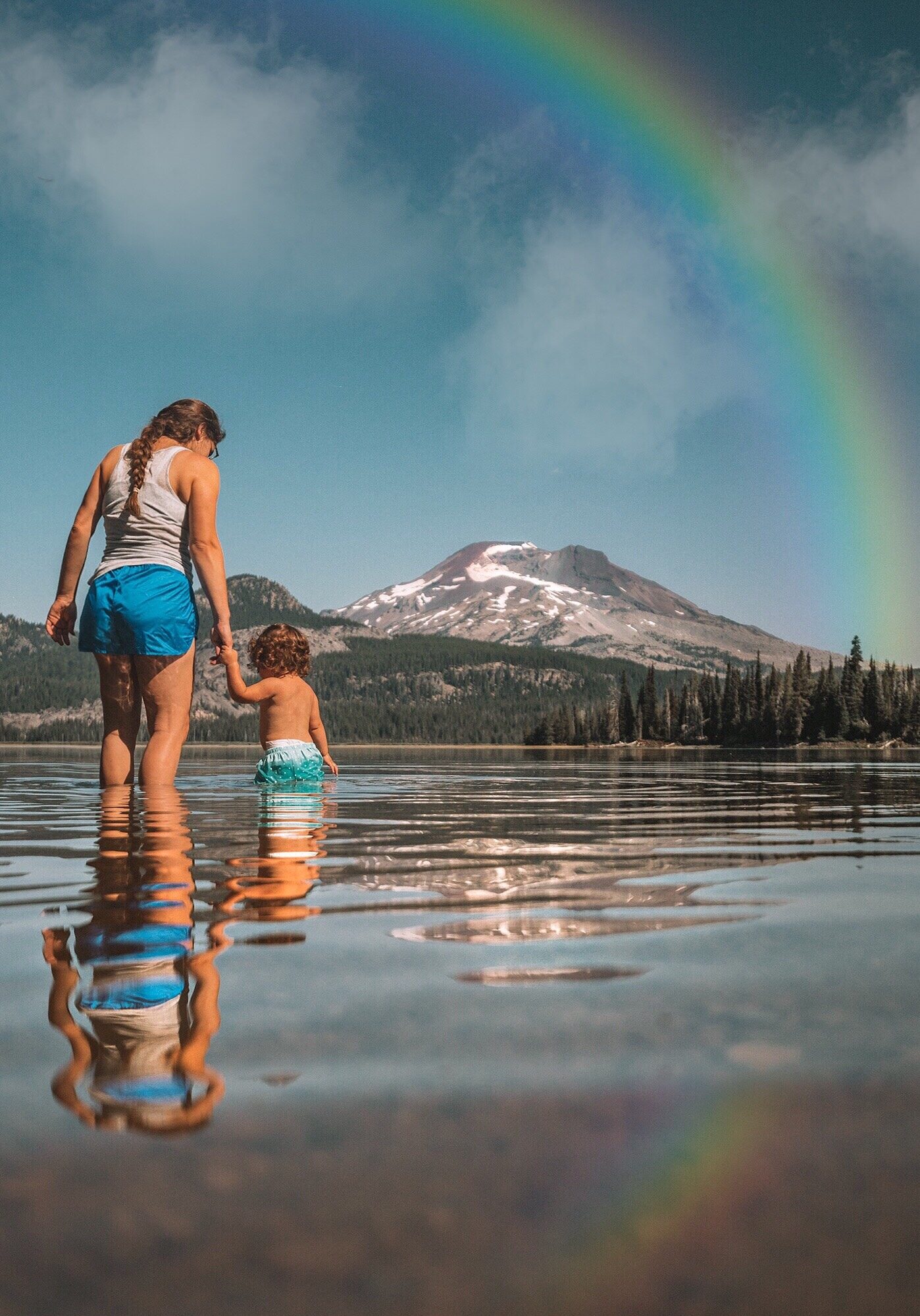 mom and daughter rainbow lake